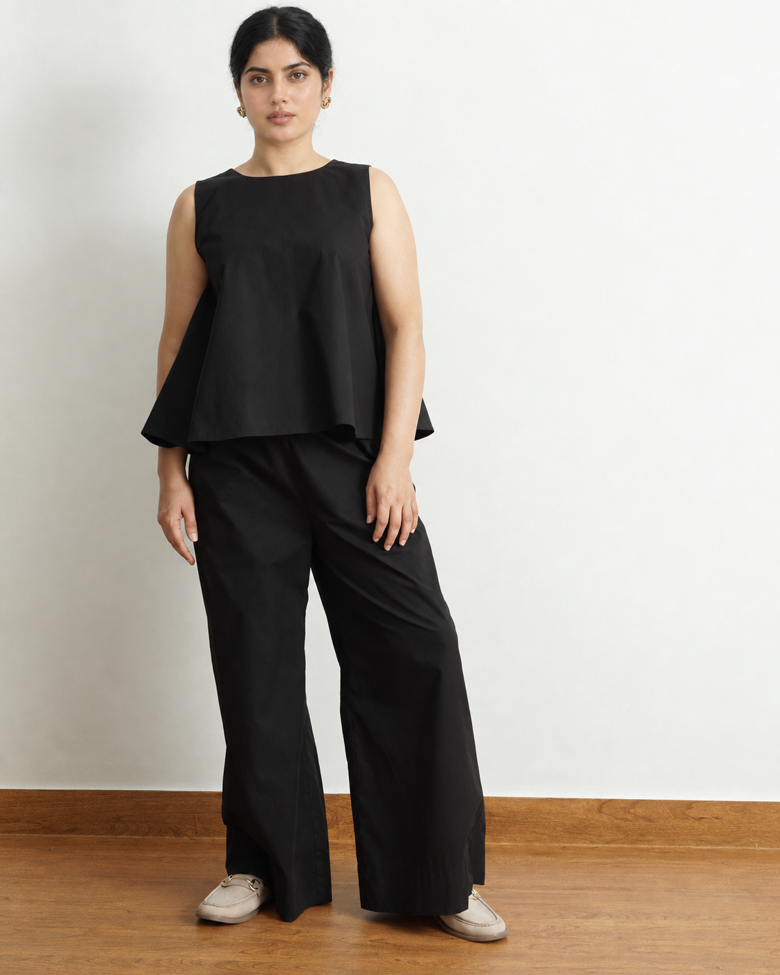 The Back  Buttoned Top in Black by Lõma — 100% cotton